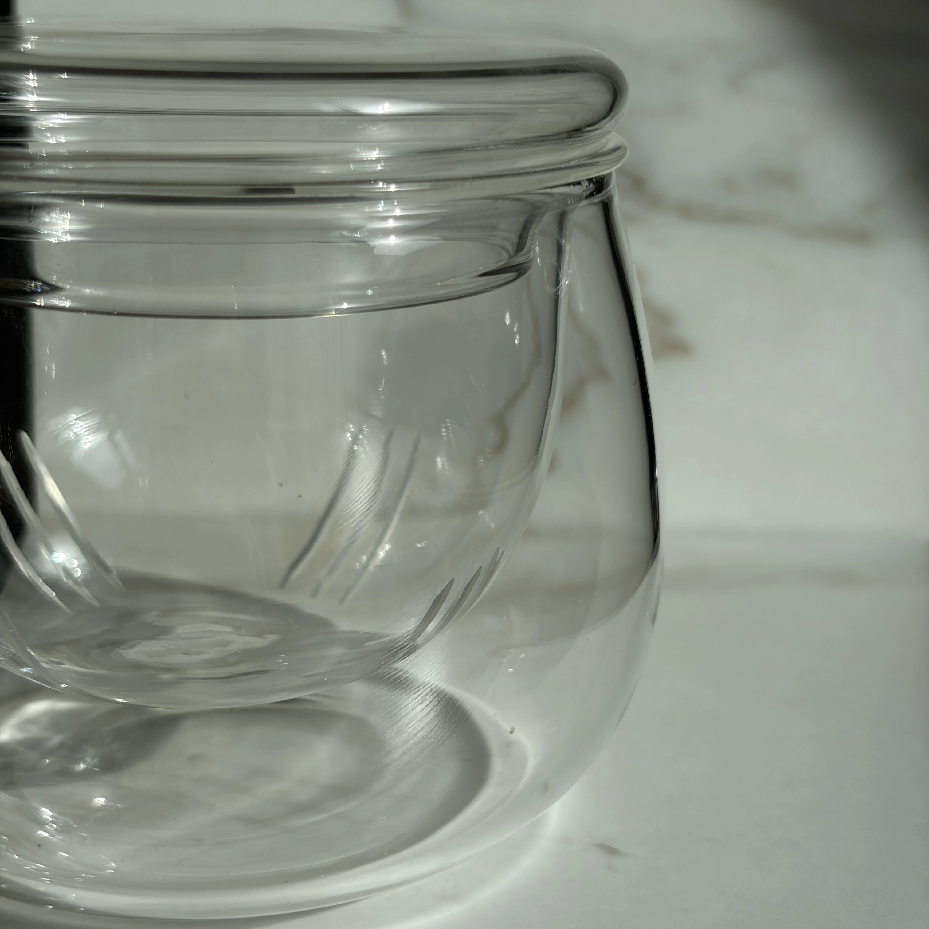 Glass tea cup with infuser and lid