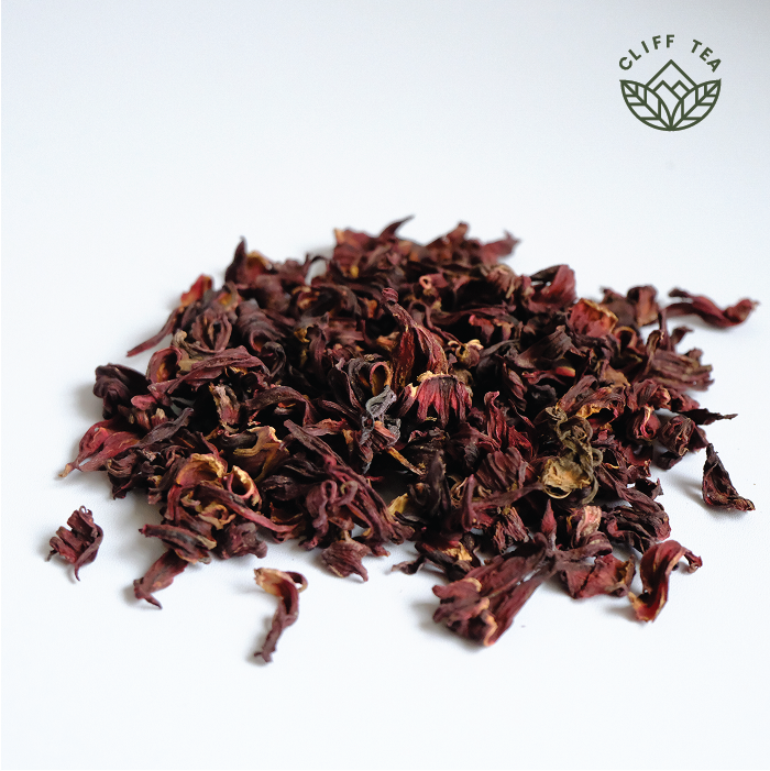 Dried hibiscus flowers in a tea cup