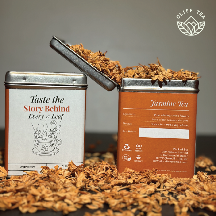 Fresh jasmine flowers with tea leaves