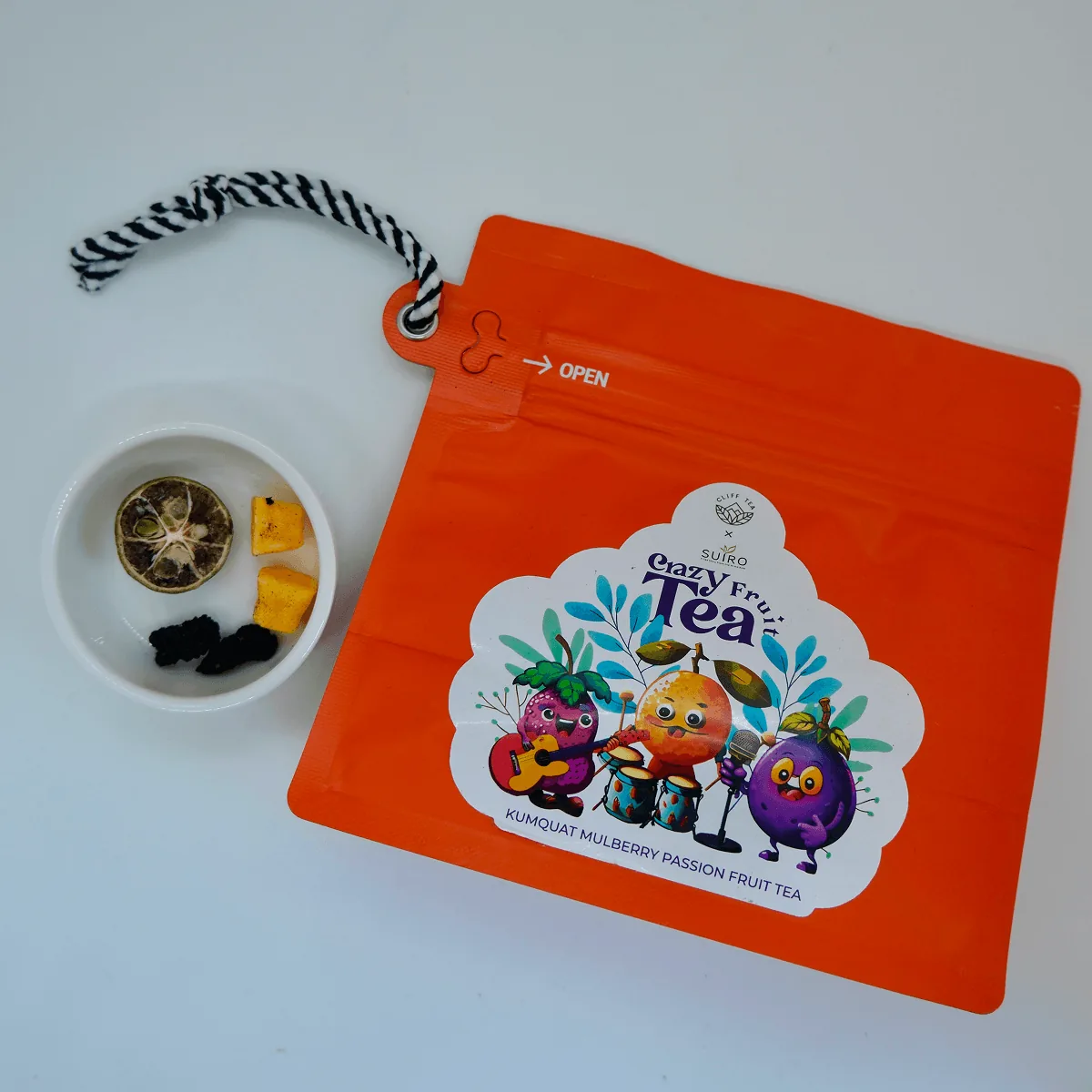 Crazy Fruit Tea pyramid bags with kumquat, mulberry and passion fruit