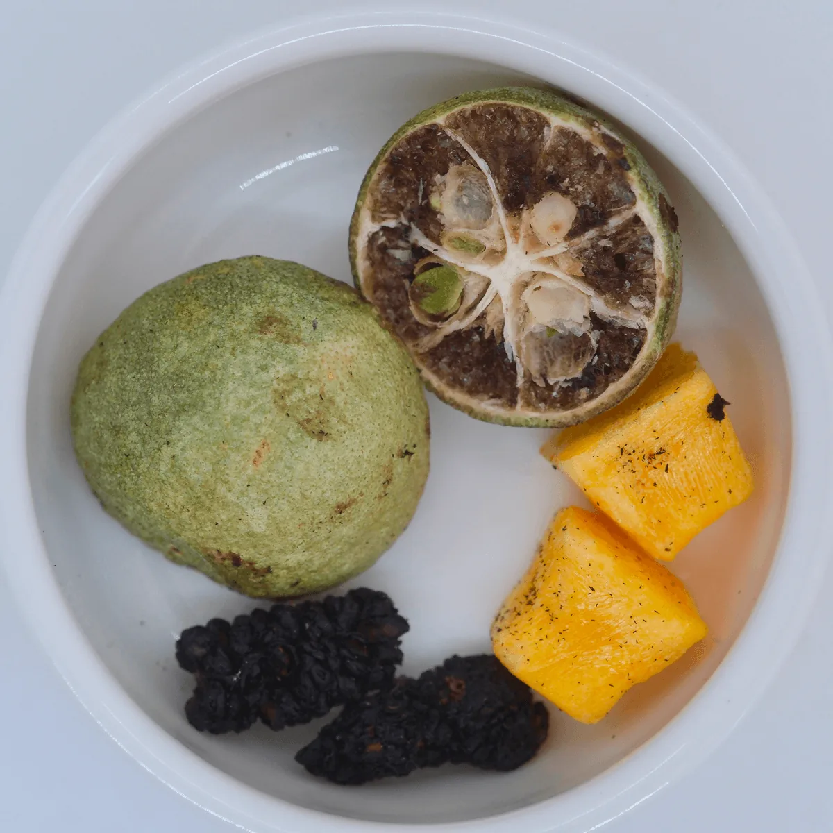 Crazy Fruit Tea pyramid bags with kumquat, mulberry and passion fruit