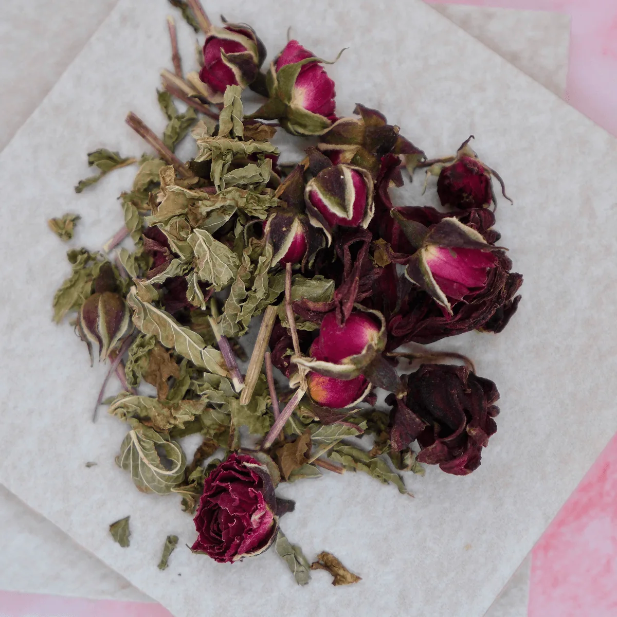 Heart Bloom loose leaf tea with hibiscus petals, rose buds and spearmint