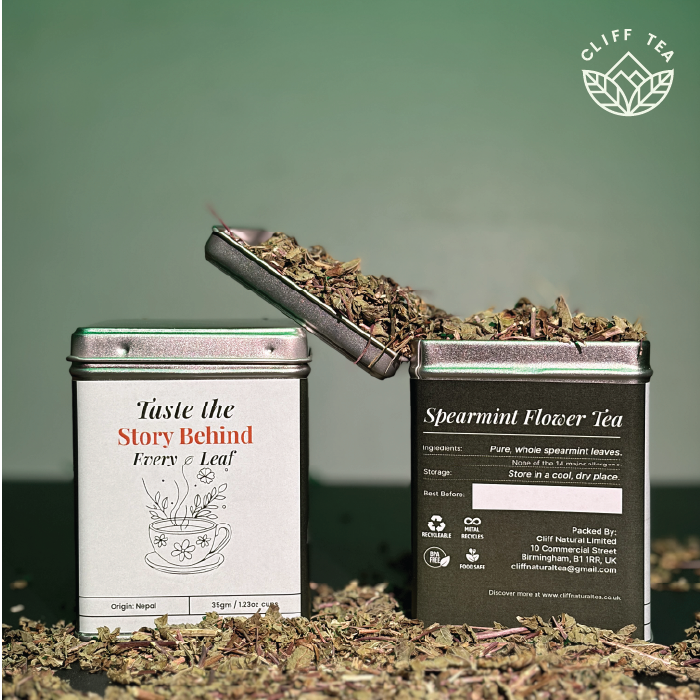 Fresh spearmint leaves in a clear glass cup